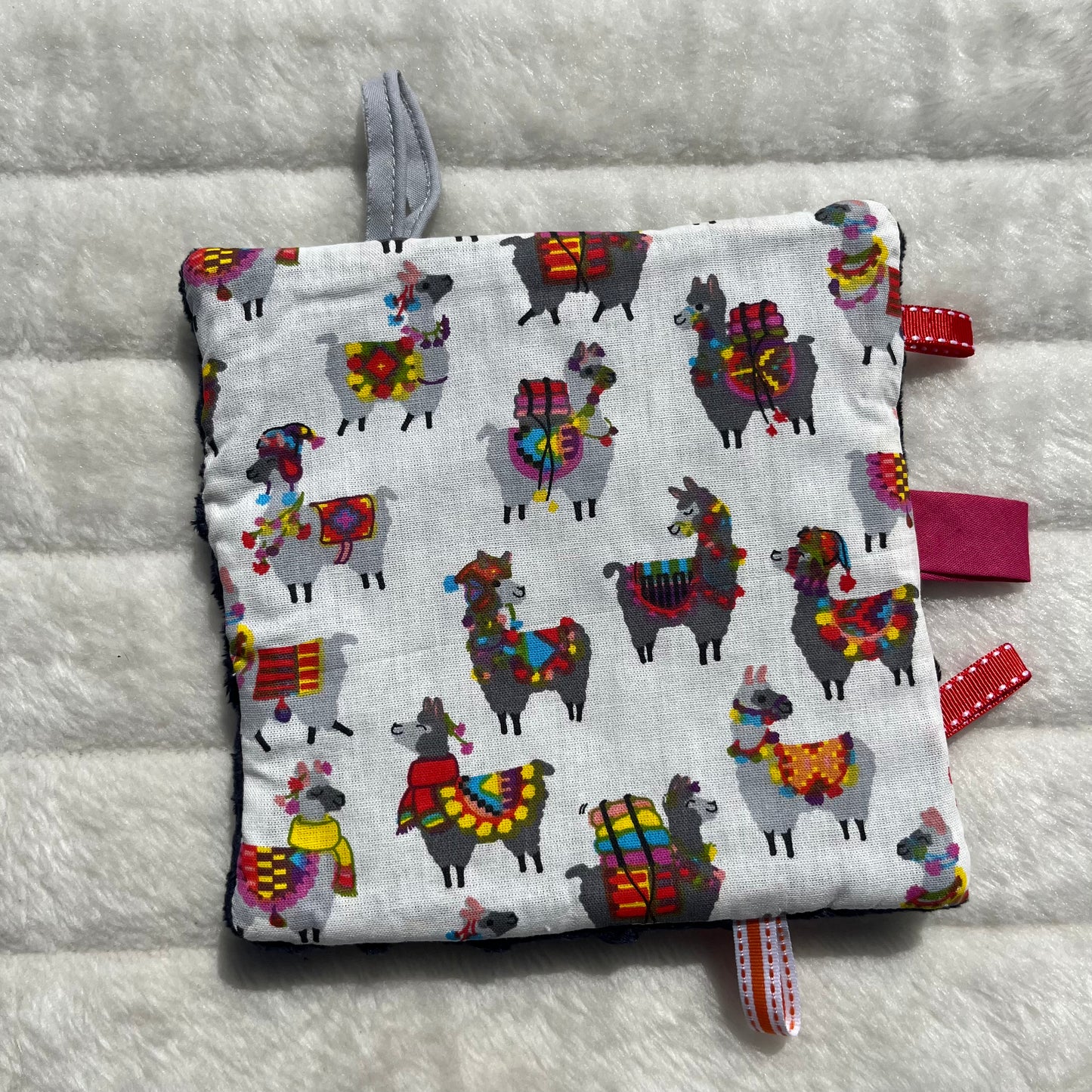 Doudou plat à motif lama