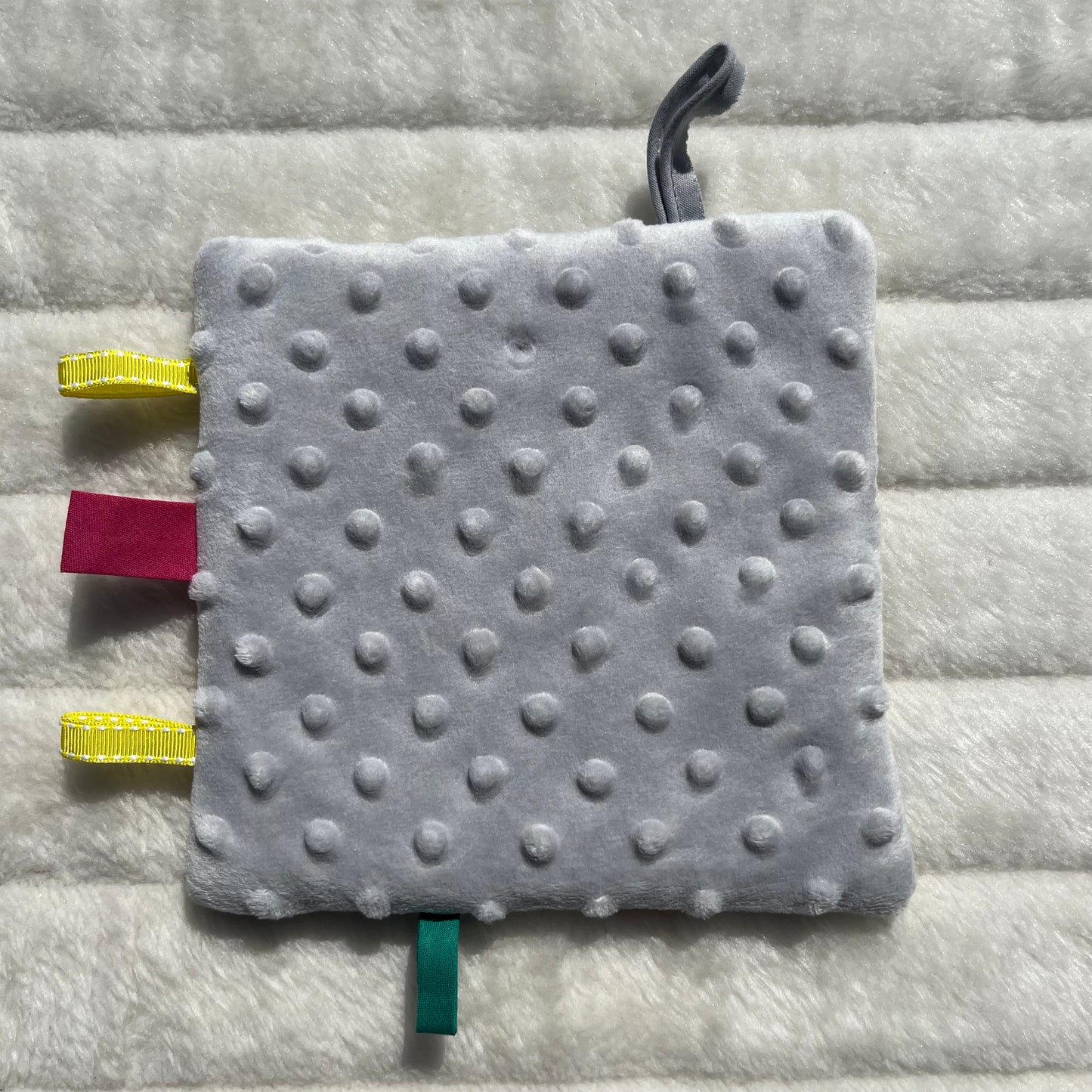 Doudou plat à motif lama