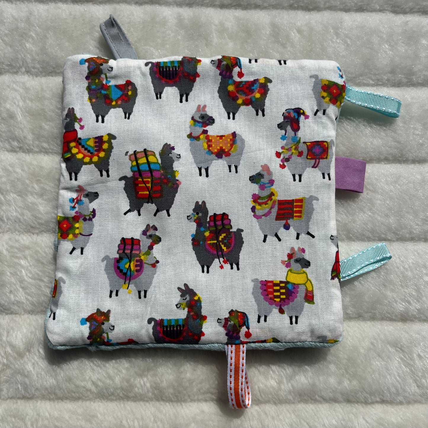 Doudou plat à motif lama