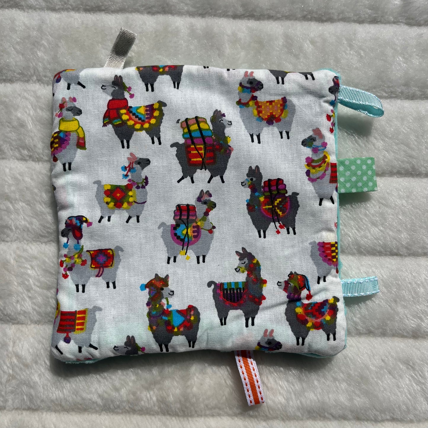 Doudou plat à motif lama