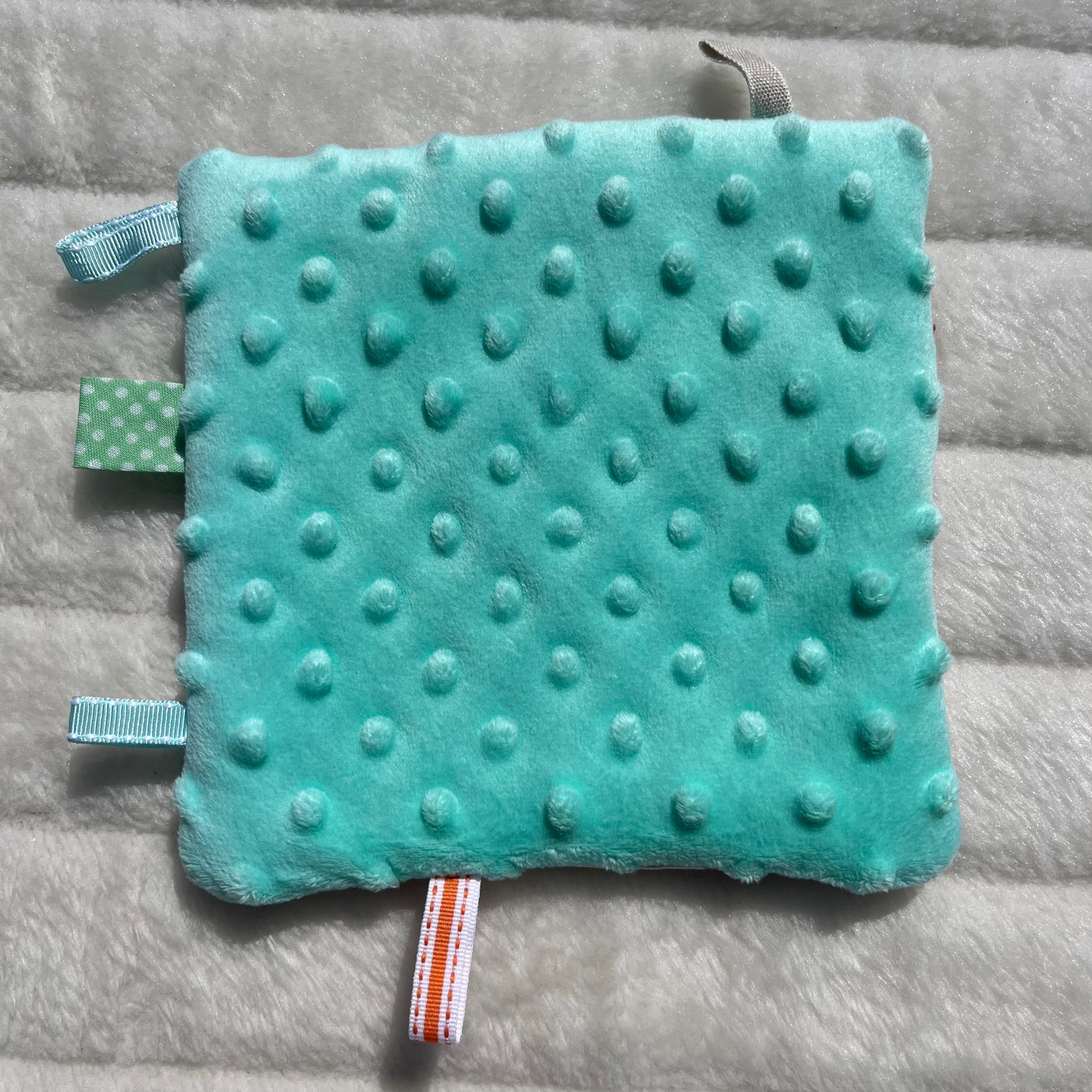 Doudou plat à motif lama