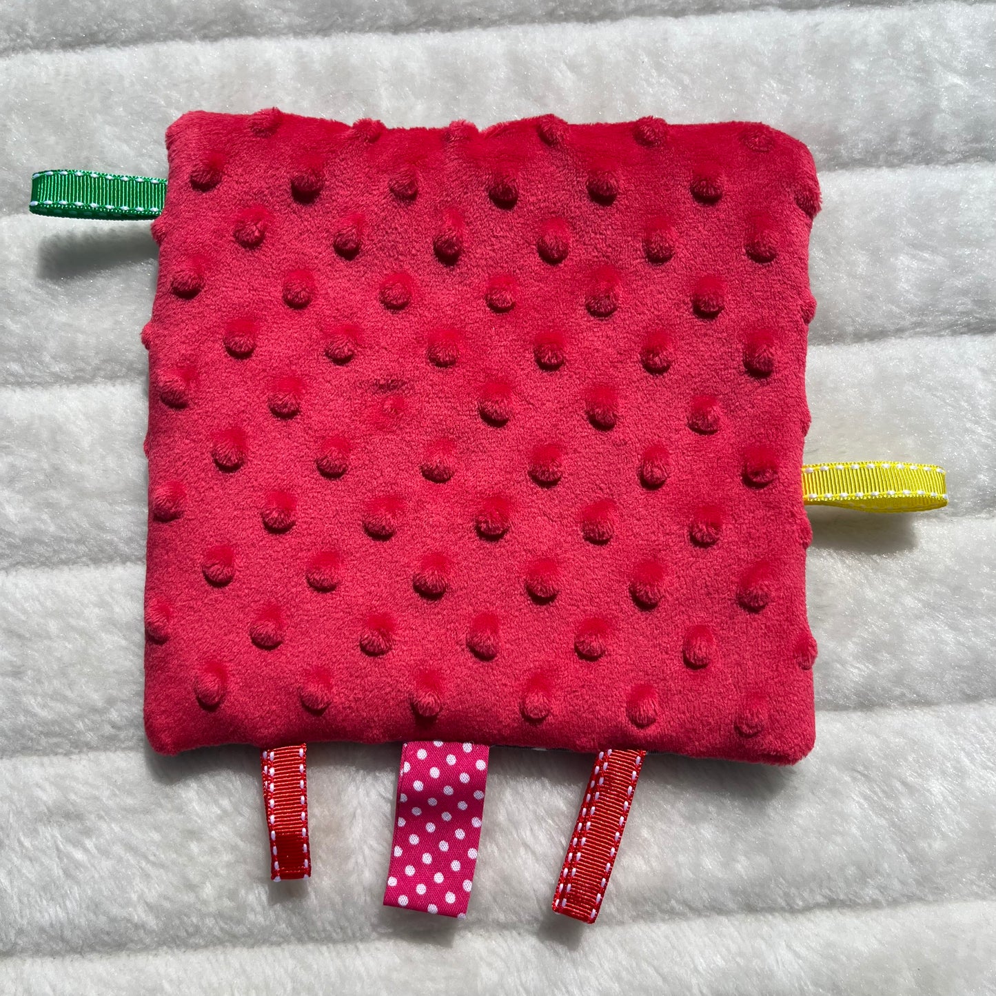 Doudou plat gris à pois blanc
