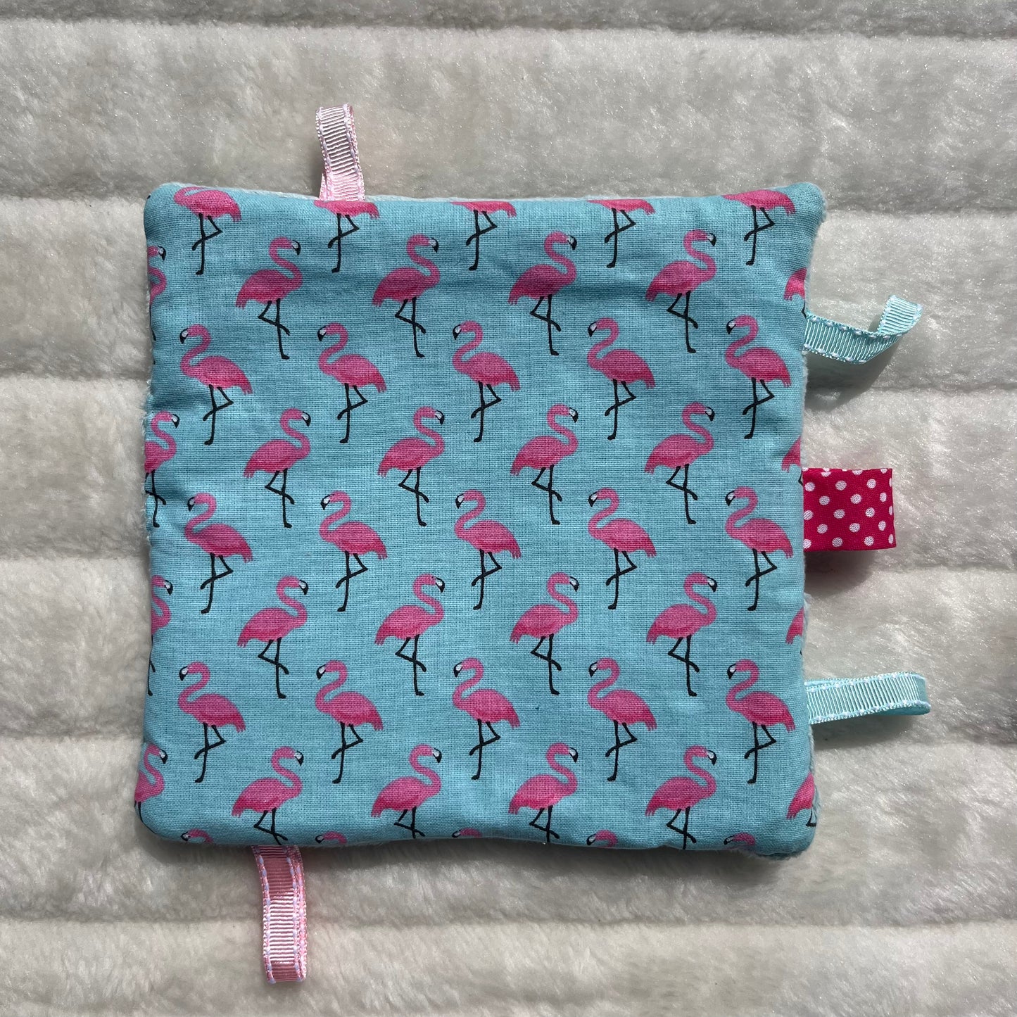 Doudou plat flamant rose