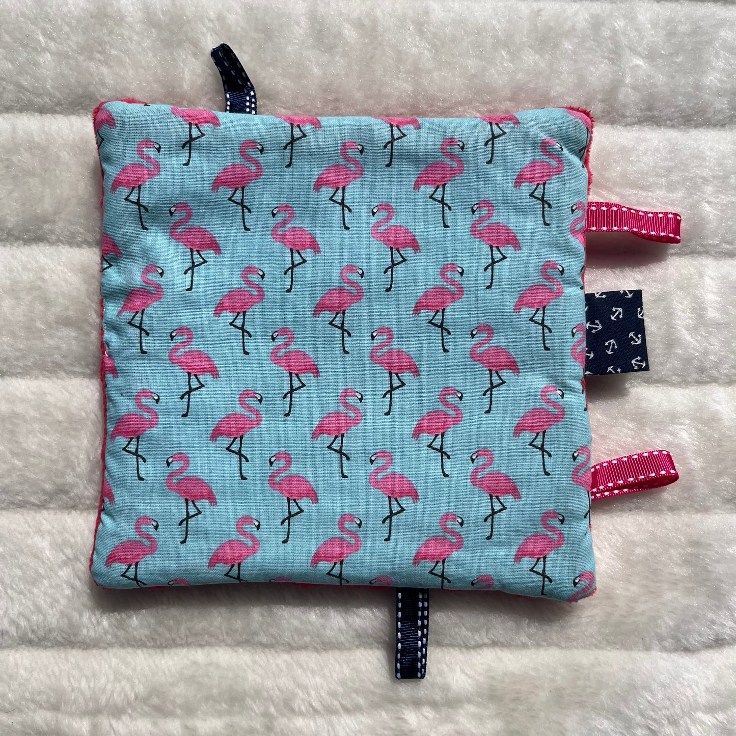 Doudou plat flamant rose