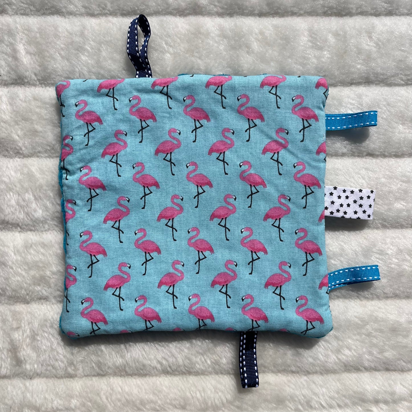Doudou plat flamant rose