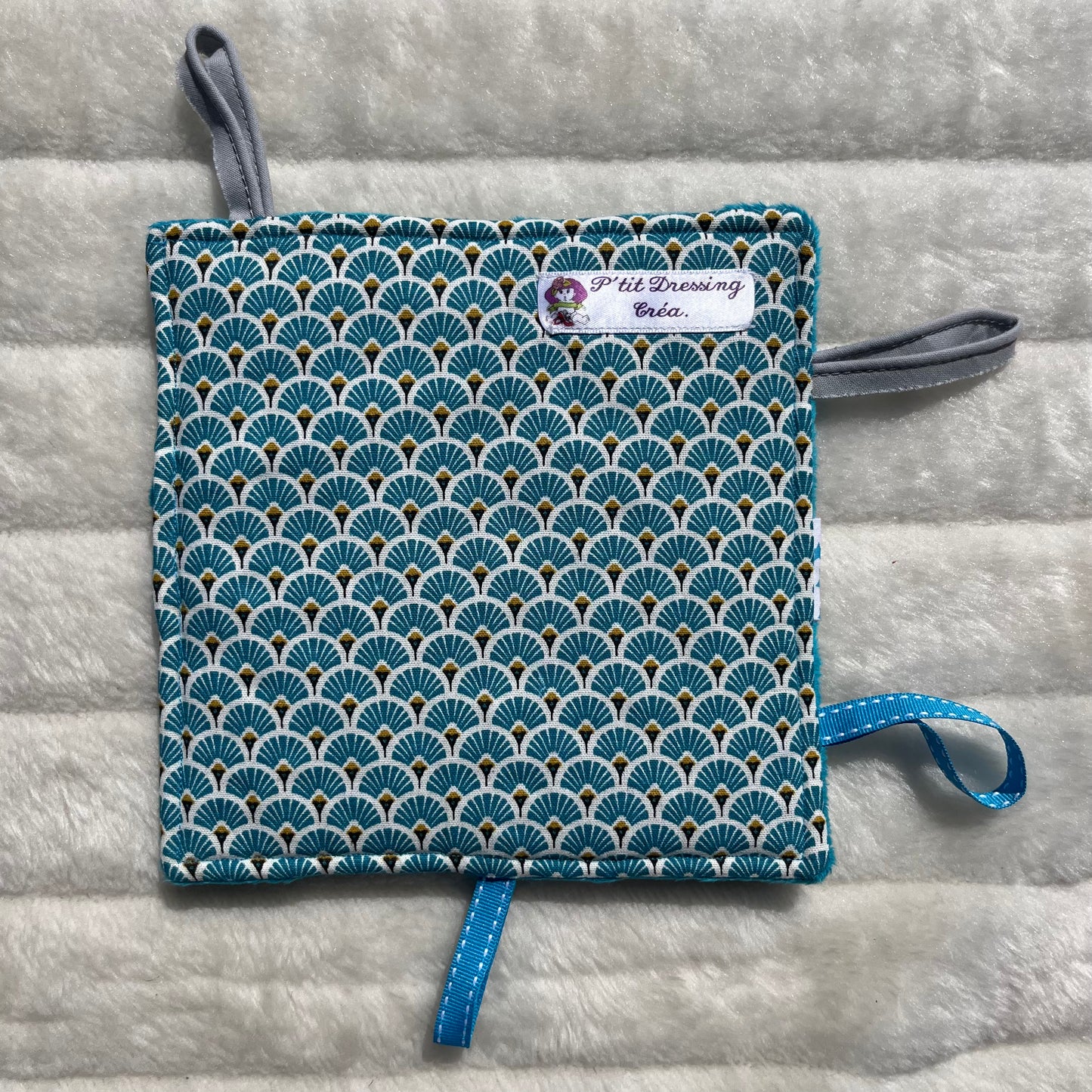 Doudou plat à motif géométrique