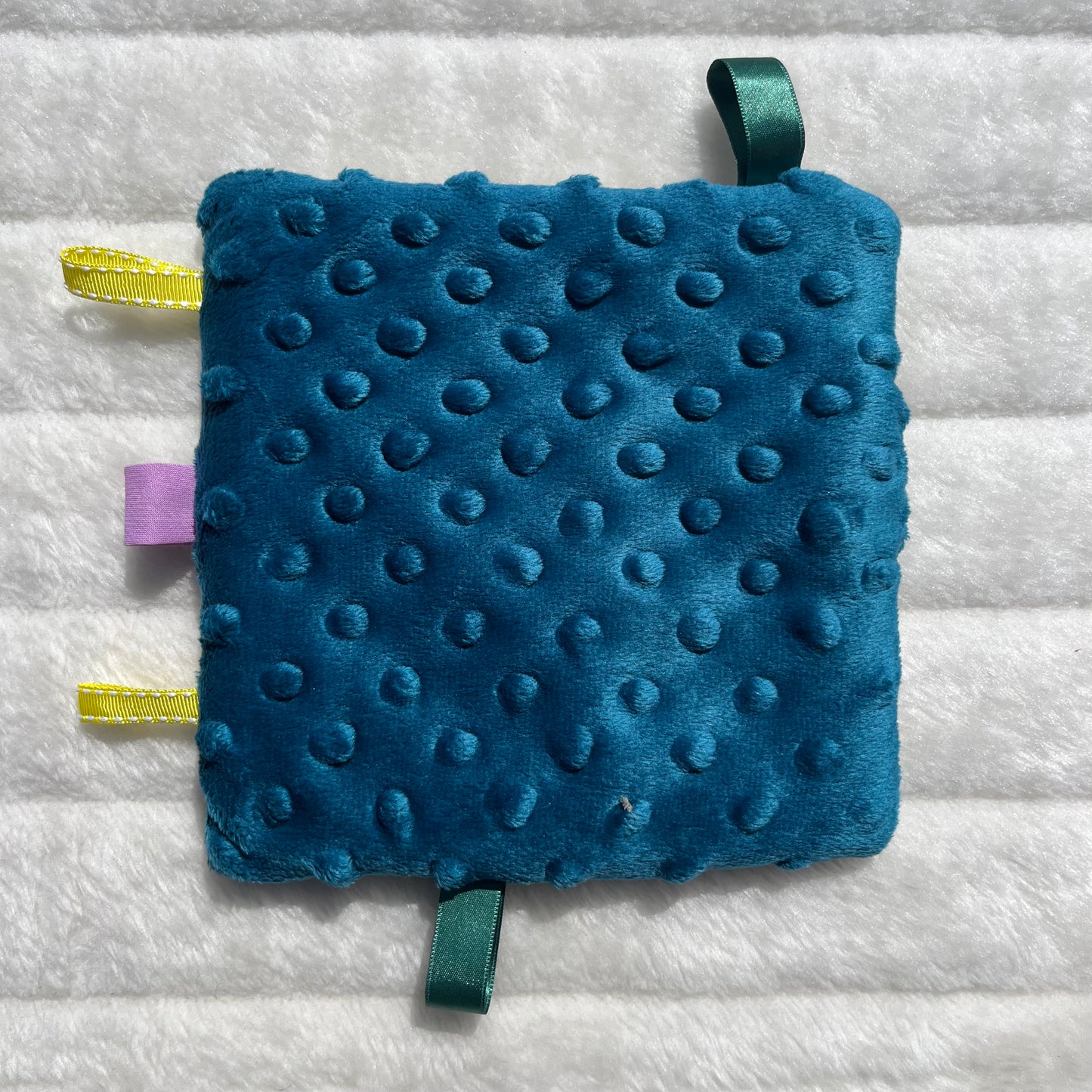 Doudou plat à motif géométrique